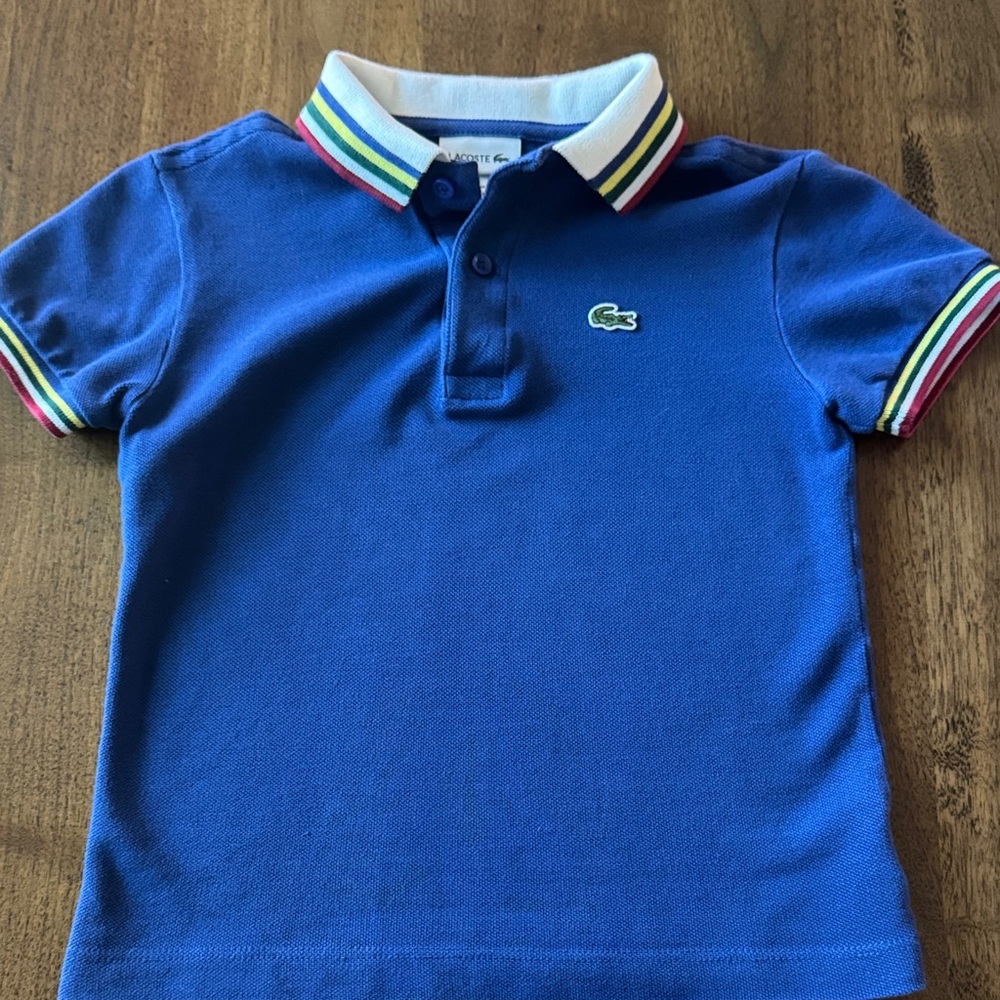 Lacoste Boys Blue Polo with Multicolor Stripe Collar